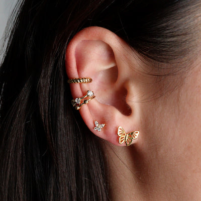 Le piercing Aya porté avec d'autres bijoux Majolie à prix doux